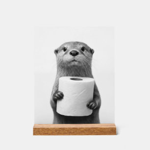 Señal Acrílica Nutria Estoica Sosteniendo Rollo de Papel Higiénic