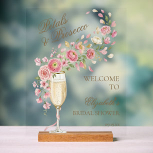 Señal Acrílica Pétalos Elegantes y Bienvenida Floral de Prosecco