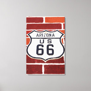 Señal de la Ruta 66 en ladrillo