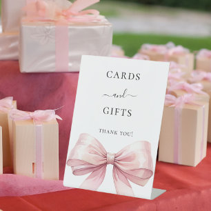 Señal de regalo de tarjetas blancas de arco rosado