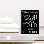 Señal Decorativa De Madera Farmhouse Chalkboard Autoservicio de lavandería Fi<br><div class="desc">Este sencillo rótulo de madera estilo casa de campo de estilo chalé es el acento perfecto para su lavandería. Personalízalo con tu nombre y/o frase deseados y hazlo tuyo! También disponible en madera blanca angustiada con texto negro. El diseño incluye material de copyright de Cricut.</div>