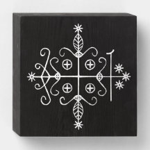 Veve blanco de Papa Legba sobre negro