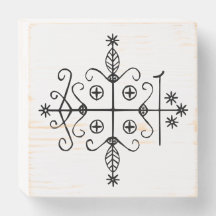 Veve negro de Papa Legba sobre blanco