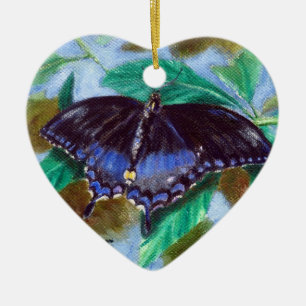 Separe su ornamento de la mariposa de las alas