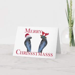 Serpientes de las Felices Navidad en astas y el