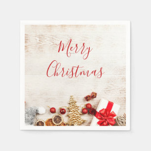 Servilleta De Papel Artículos con tema de Navidad en una tabla de made
