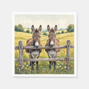Servilleta De Papel Burros levantados detrás de una cerca en una paste