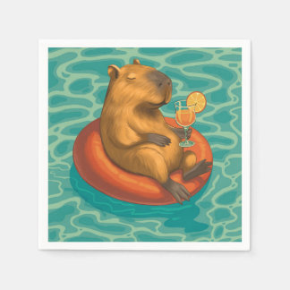 Servilleta De Papel Capylara cocktail sur bouée à la piscine