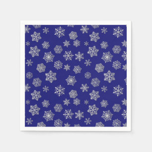 Servilleta De Papel Copos de nieve plateados en un fondo azul oscuro