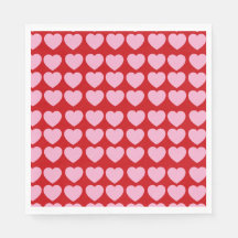 Corazones de San Valentín rosados sobre rojo