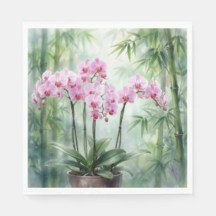 Servilleta De Papel Planta de orquídea rosa sobre fondo de bambú