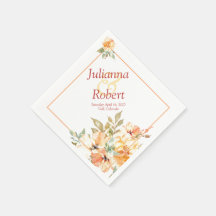 servilletas florales de color naranja y amarillo a