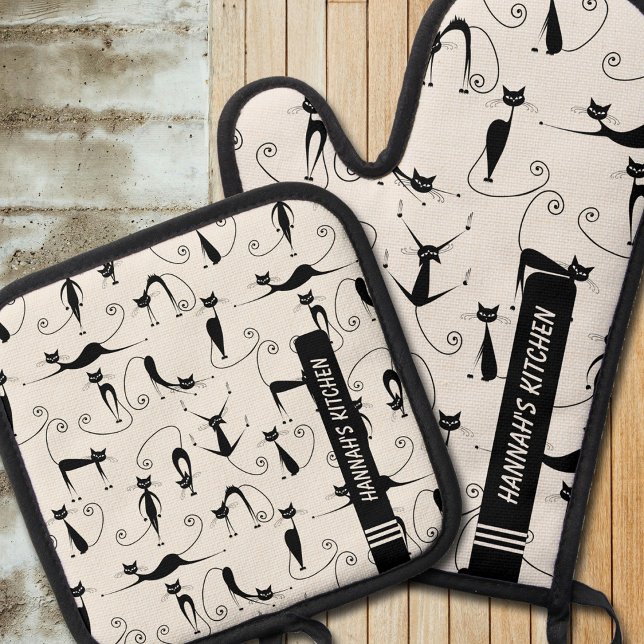 Set De Manoplas Gato negro moderno de mediados de siglo (Make every day in the kitchen a blast with this fun mid-century modern cat pattern on pot holders.)
