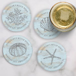 Set De Posavasos Beach House Vintage Sea Shells Coral Personalizado<br><div class="desc">Súper lindo conjunto de gallos con gráficos de mar de estilo vintage - una concha, erizo de mar, pez estrella y coral conjunto con un fondo de madera azul templado. Agregue dos líneas de texto personalizado para personalizar. Perfecto para una casa de playa, alquiler de vacaciones, cabaña náutica costera, bodas...</div>