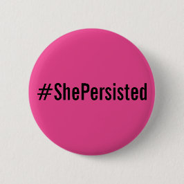 #ShePersistent, texto negro en negrita sobre botón