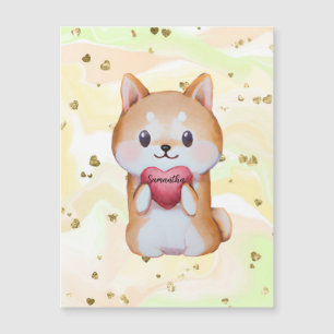 Shiba Inu sosteniendo un corazón