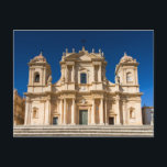 Sicilia - Catedral de la postal de Noto<br><div class="desc">La catedral de Noto es una catedral católica romana de Noto, en Sicilia, Italia. Su construcción, al estilo del barroco siciliano, comenzó a principios del siglo XVIII y terminó en 1776. Está dedicado a San Nicolás de Myra y ha sido la catedral de la Diócesis de Noto desde el establecimiento...</div>