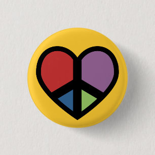 Signo de la paz en un botón del corazón