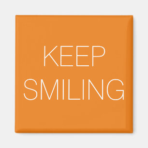 Sigue sonriendo, imán blanco naranja
