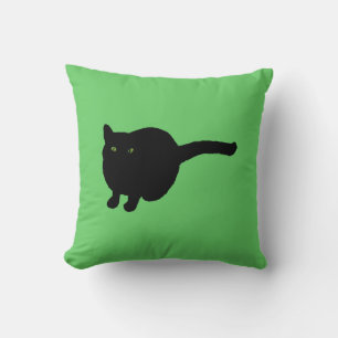 Silhouette de gato negro con ojos verdes almohada 
