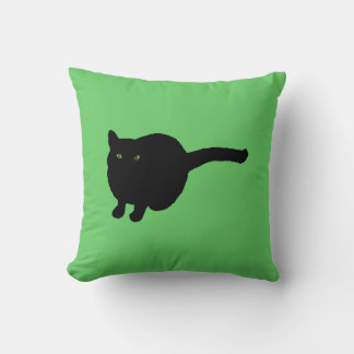 Silhouette de gato negro con ojos verdes almohada 