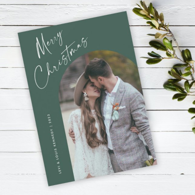 Simple Script Boho Arch Navidad (Simple script boho arch photo Christmas holiday card with modern elegant handwritten typography.)