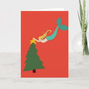 Sirena roja que coloca la estrella en tarjetas de
