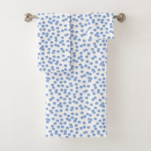 Sistema azul de la toalla del cuarto de baño de