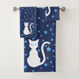 Sistema blanco de la toalla de baño del gato