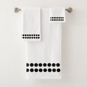 Sistema blanco de la toalla del punto negro