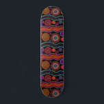 Skateboard Colorido patrón tribal de arte de dot australiano<br><div class="desc">Este diseño moderno presenta un coloreado patrón de puntos tribales pintados en naranja brillante,  morado,  verde,  turquesa y blanco sobre un fondo negro.</div>