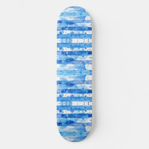 Skateboard Decoración a rayas azules y blancas en la playa