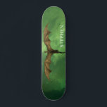 Skateboard Dragón volador Nebulosa Verde Galaxia Monograma<br><div class="desc">Este diseño se puede personalizar eligiendo la opción personalizar para añadir texto o realizar otros cambios. Si este producto tiene la opción de transferir el diseño a otro artículo, asegúrese de ajustar el diseño para que se ajuste si es necesario. Contáctame en colorflowcreations@gmail.com si deseas tener este diseño en otro...</div>