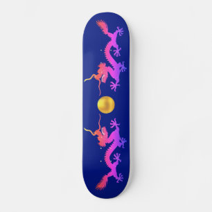 Skateboard Dragones en tonos rosa, rojo y azul en azul