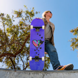 Skateboard Mariposa negra en el corazón del arcoiris