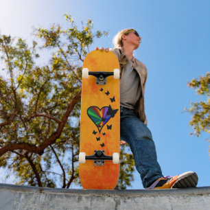 Skateboard Mariposa negra en el corazón del arcoiris