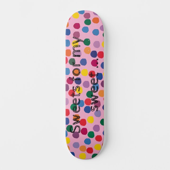 Skateboard mit bunten Punkten und rosa Hintergrund (Anverso)