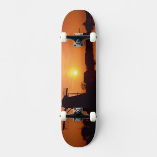 Skateboard Molinos de viento al atardecer, Kinderdijk, Países