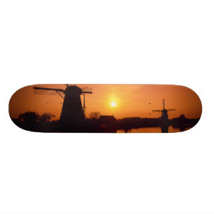Skateboard Molinos de viento al atardecer, Kinderdijk, Países