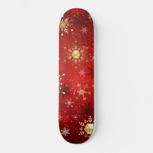 Skateboard Navidades Copos de nieve dorados con fondo rojo