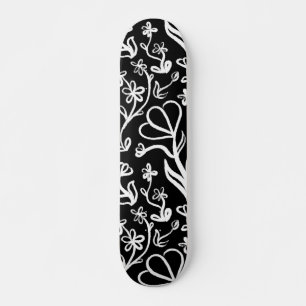Skateboard Patrón floral en blanco sobre negro