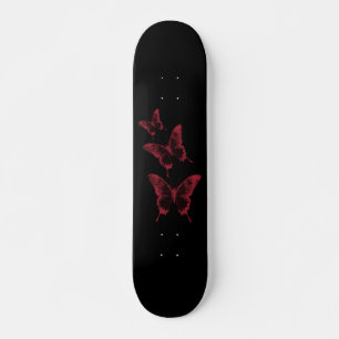 Skateboard Piscina de patinaje sobre mariposa negra y roja de