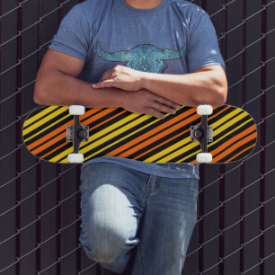 Skateboard Rayas verticales amarillas y naranjas negras  