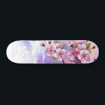 Skateboard Sakura rosa sobre fondo de pintura<br><div class="desc">Dibujado artísticamente, rama de rosa, flores de cerezo sobre fondo pintoresco, texturizado, pintado con pintura blanca, rosa y azul. Pink Sakura</div>