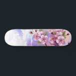 Skateboard Sakura rosa sobre fondo de pintura<br><div class="desc">Dibujado artísticamente,  rama de rosa,  flores de cerezo sobre fondo pintoresco,  texturizado,  pintado con pintura blanca,  rosa y azul. Pink Sakura</div>