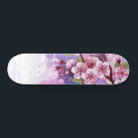 Skateboard Sakura rosa sobre fondo de pintura<br><div class="desc">Dibujado artísticamente, rama de rosa, flores de cerezo sobre fondo pintoresco, texturizado, pintado con pintura blanca, rosa y azul. Pink Sakura</div>