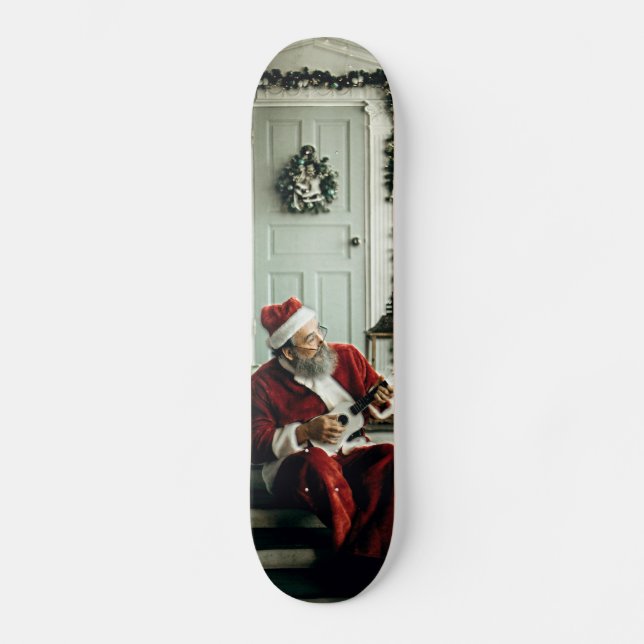 Skateboard Santa Claus reproduciendo música (Anverso)