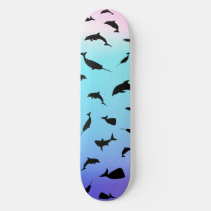 Skateboard shadow fish shark whale on gradient ocean