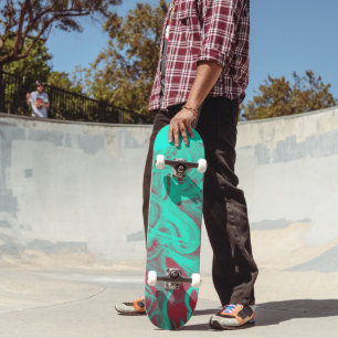 Skateboard verde azulado y rojo