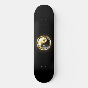Skateboard Yin Yang dorado en negro